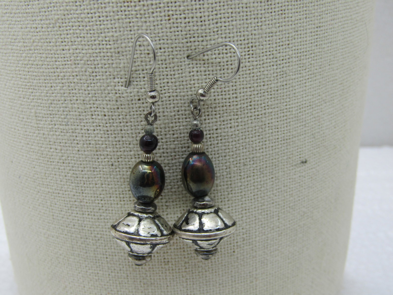 Southwestern Boho Themed Metallic & Silver Dangle Earrings, 2.25": Southwestern Boho Themed Metallic & Silver Dangle Earrings, 2.25", costume, silver tone with a coppery and peacoch shimmery metallic bead above a silver bead. 2.25" from the bend in the hook post.