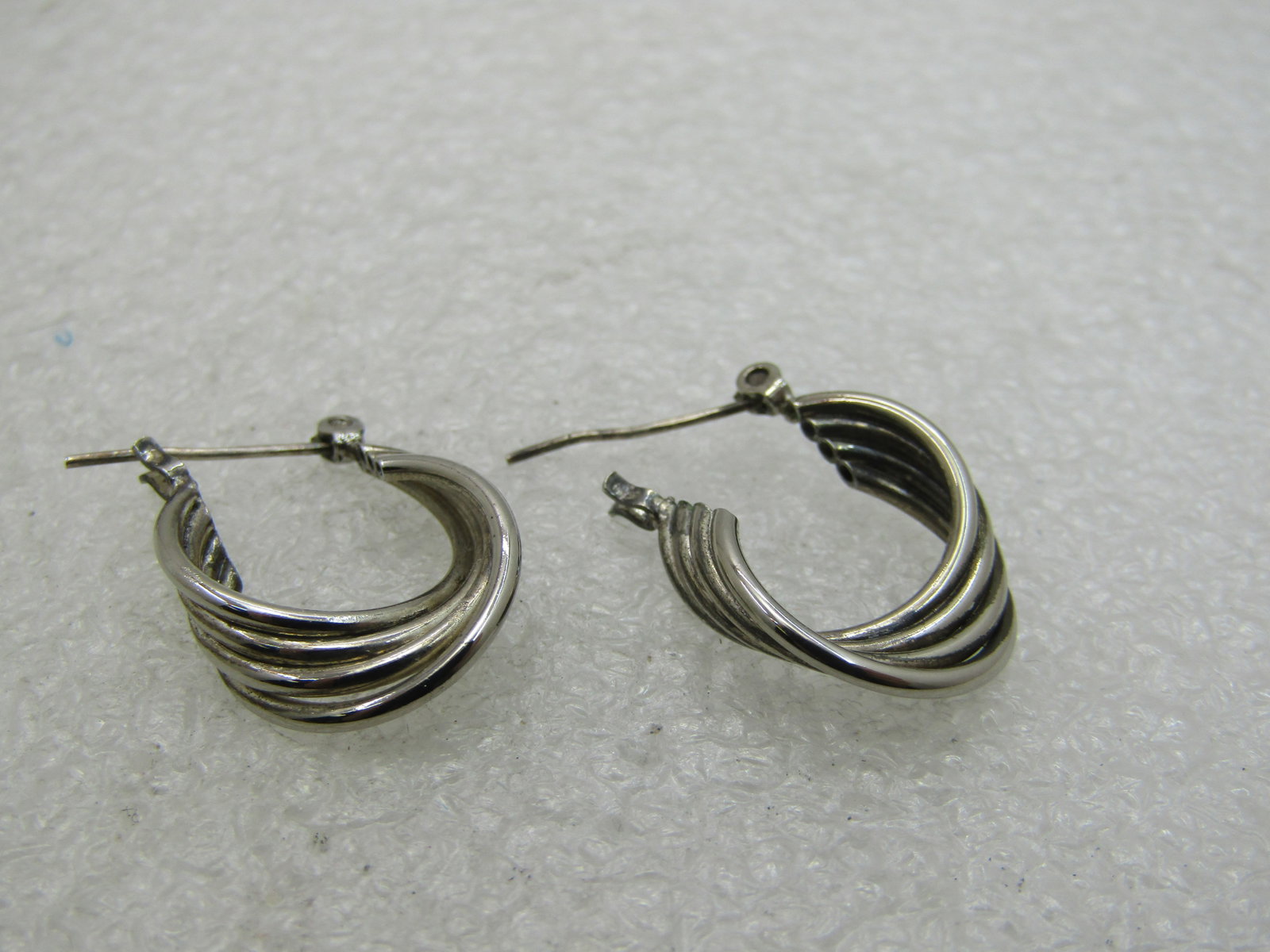 Vintage Triple Hoop Earrings, Sterling Post, 3/4": Vintage Four Hoop Earrings, Sterling Post, 3/4" lont and 5/8" wide. The hoops are tubular 3/4" round and silver tone, the post is marked sterling and tested. Good condition, not signed by maker. Some 