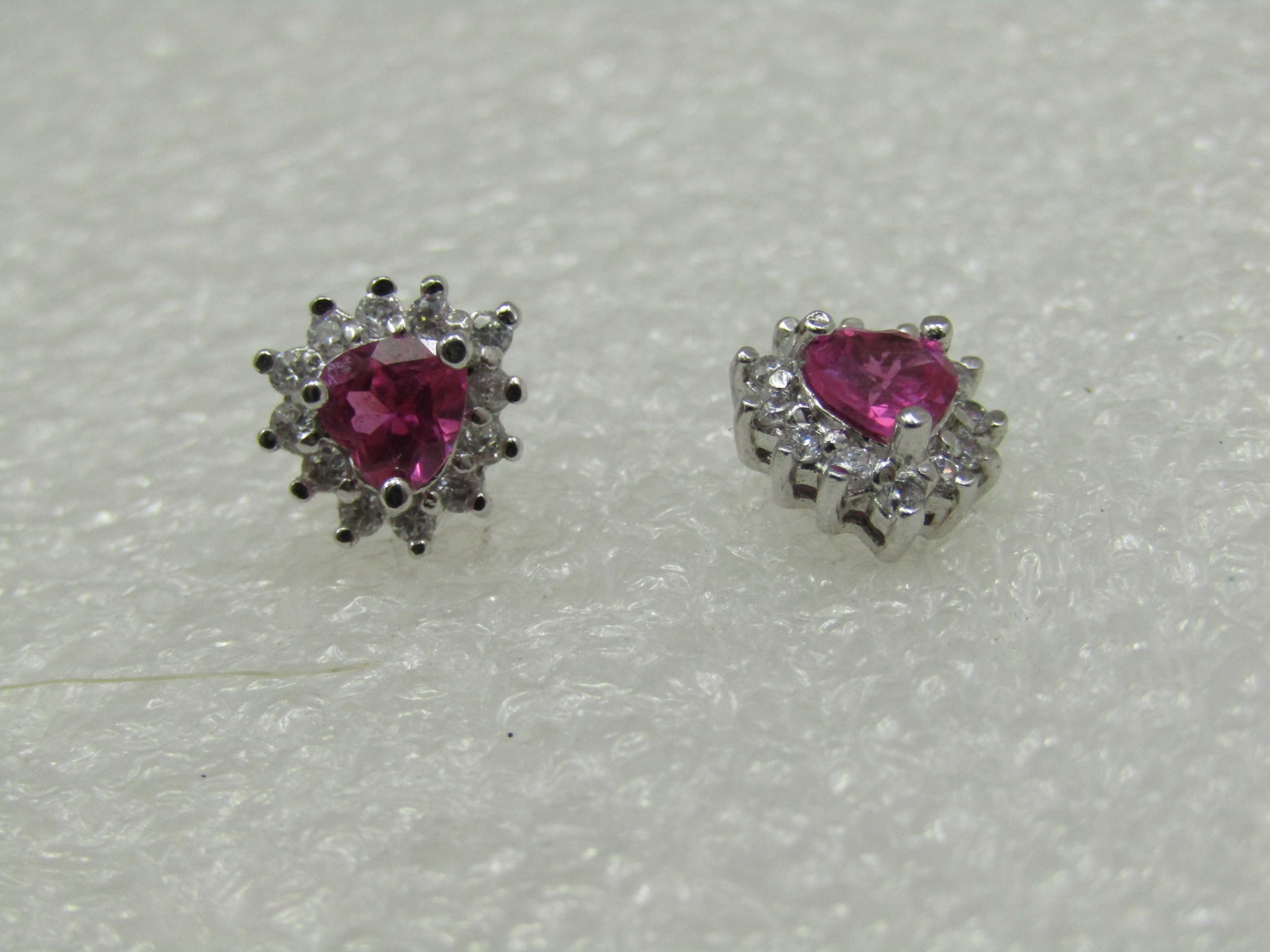 Sterling Heart Halo Red Clear CZ Earrings, Kay Jewelers: Sterling Heart Halo Red Clear CZ Earrings, Kay Jewelers. Vintage new stock. Marked .925 and signed WM and CZ. weight is appx. 2.12gr for both earrings. They have a center pink to light red ruby