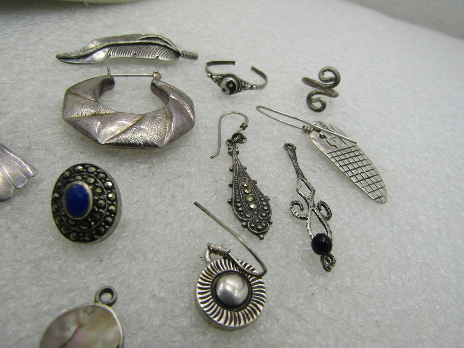 12 Sterling Pieces, Single Earrings, Dangles, more. 25.49 grams - 4