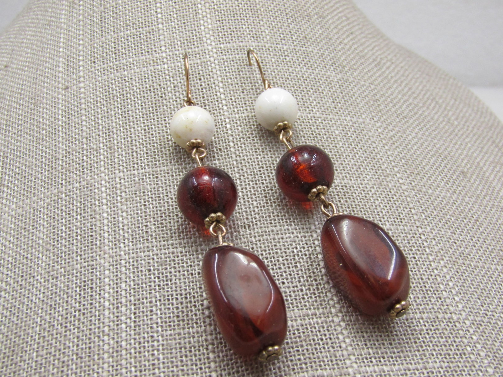 Vintage Erica Lyons Faux Amber Earrings, Pierced Drop: Vintage Erica Lyons Faux Amber Earrings, Pierced Drop, vintage new on card. They are appx. 3" long from the curve in the hook post with a 9.5mm white bead on top and a 12mm simulated amber bead next a