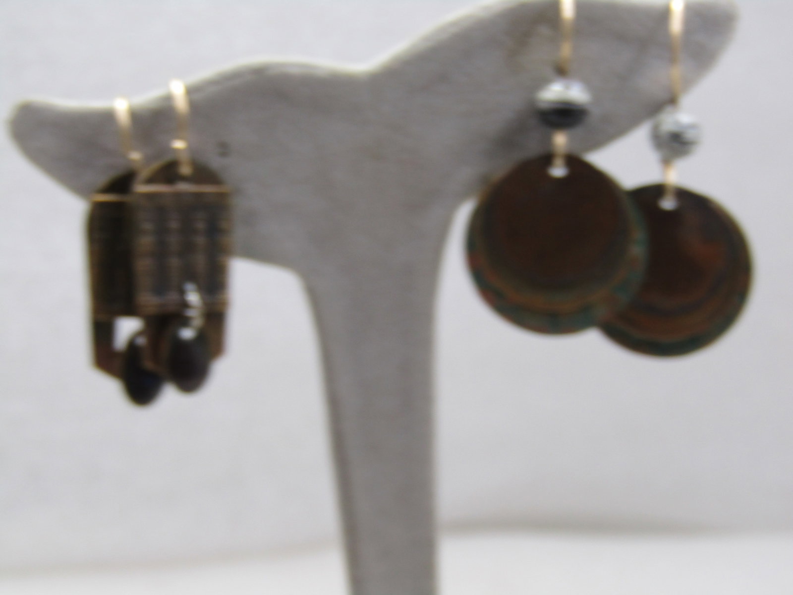 Vintage 2 Pair Boho Dangle Earrings, Pierced,, 1980's-1990's: Vintage 2 Pair Boho Dangle Earrings, Pierced,, 1980's-1990's. These are brass cirlces or tile like dangales. The one pear is 1.5" long from the curvein the hook post with a black and white agate like 