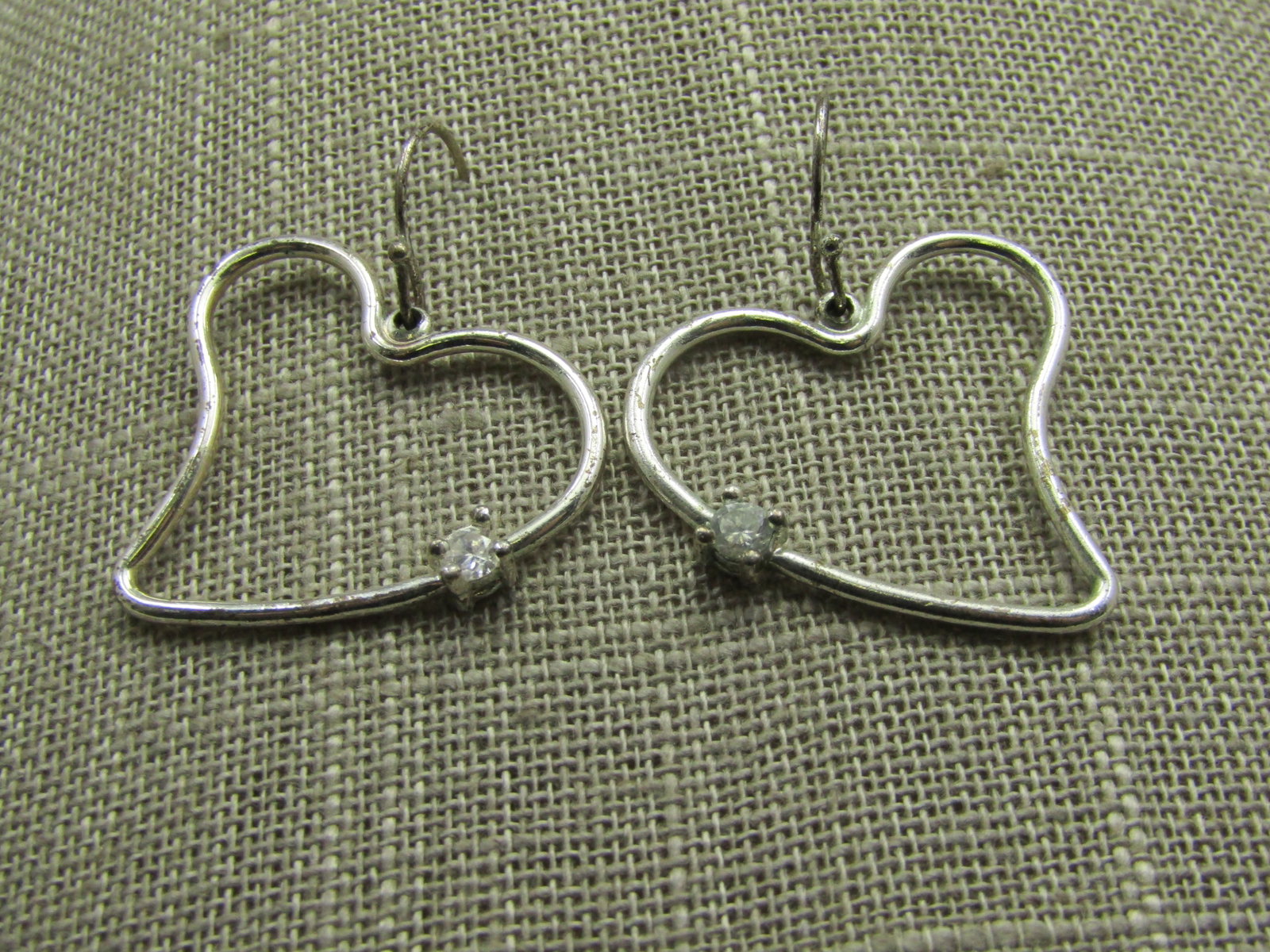 Heart Hoop Rhinestone Pierced Earrings, Silver Tone, 1.5": Heart Hoop Rhinestone Pierced Earrings, Silver Tone, 1.5" and 1-1/8" wide. A single 3.5mm rhinestone accents the side of the heart. Not signed by the maker. Age is appx. 1980's-1990's. Good