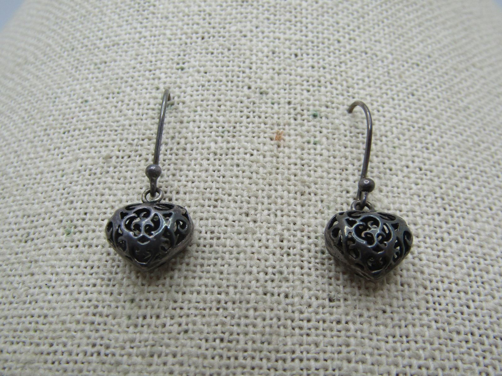 Vintage Sterling Puffy Scrolled Heart Earrings, Pierced: Vintage Sterling Puffy Scrolled Heart Earrings, Pierced. They are appx. 1.25" long from the top of the box to the bottom of the heart. The heart itself is appx. 1/2" wide and tall and is appx. 6mm thi