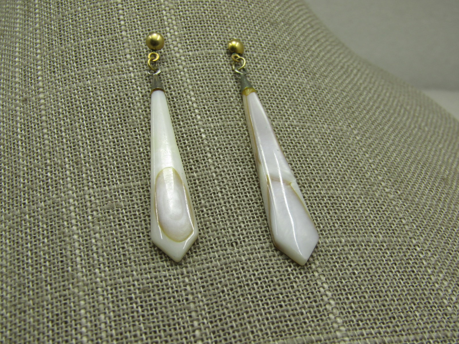 Vintage Mother-of-Pearl Dangle Earrings, Piereced 2.5": Vintage Mother-of-Pearl Dangle Earrings, Piereced 2.5" long and 3/8" wide, tapered. Ball stud with the white and tan mother-of-pearl pointed rop - like a man's tie. Two-tone. Not signed by the maker. 