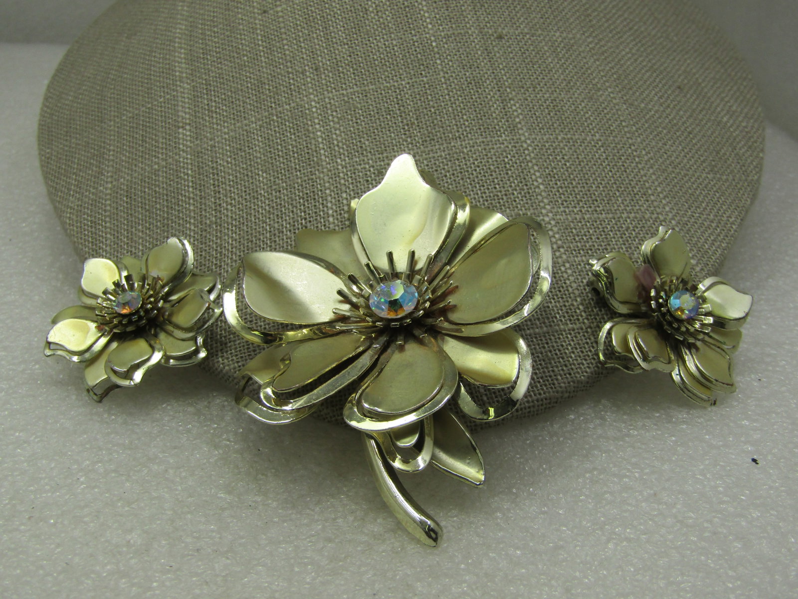 Vintage Large Tiered Bow & Clip Earrings Set, with Rhinestone, 1960's-1970's: Vintage Large Tiered Bow & Clip Earrings Set, with Rhinestone, 1960's-1970's. The brooch is 3" tall and appx. 2.25" wide and made of satin-finish petals that are in tiers with a smooth and shiny frame