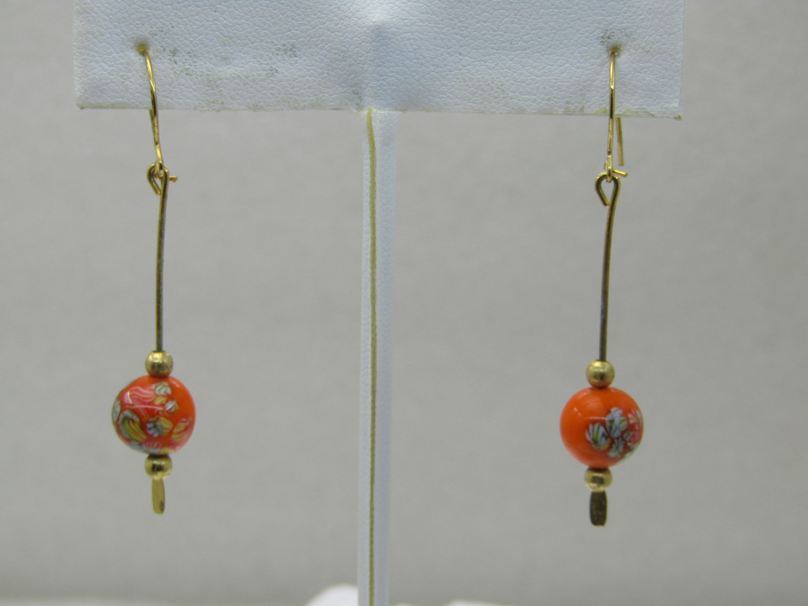 Vintage Orange Floral Glass Beaded Earrings, Drop Pierced: Vintage Orange Floral Glass Beaded Earrings, Drop Pierced, 2", hook wires with lock. 9.5mm beads with gold accent beads above and below. 1960's-1970's. Gld tone. Not signed by the maker. Light wear.