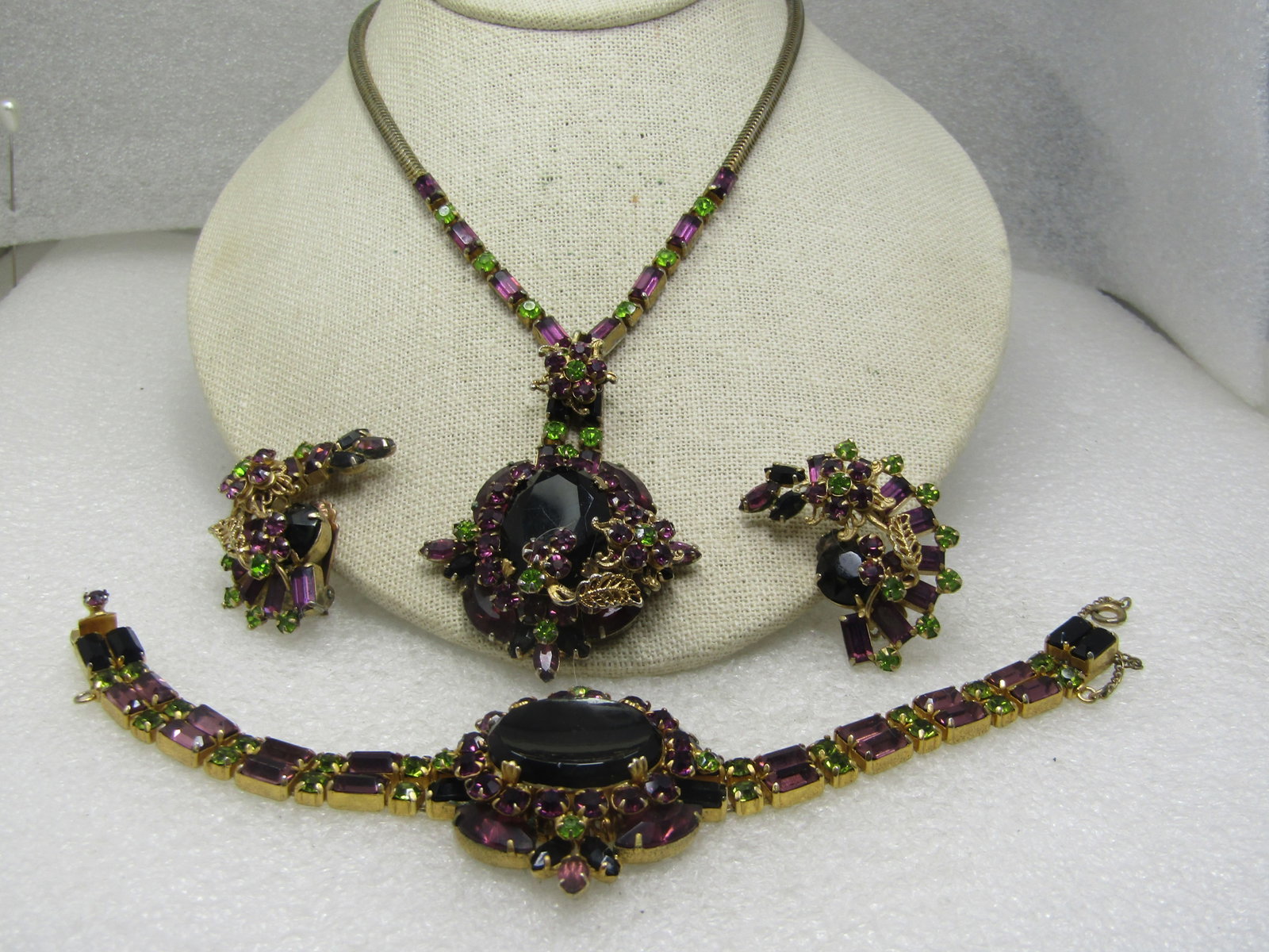 Vintage Black, Amethyst Glass Demi Parure 3 Pc. Set, 1940's, 15": Vintage Black, Amethyst Glass Demi Parure 3 Pcs. Set, 1940's, 15". Stunning set - Necklace, Bracelet and Earrrings . The necklace has a gold tone square snake chain with fli pclasp and a stunning purp