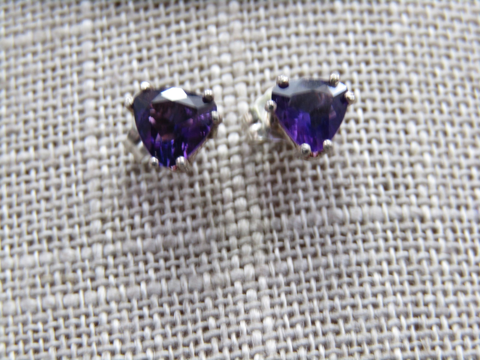 Sterling Silver Trilliant Amethyst Earrings, Pierced Studs: Sterling Silver Trilliant Amethyst Earrings, Pierced Studs, appx. 5mm stones set in sterling. Very good condition. They are marked sterling and also marked III. Great for everyday to weddings. (INV.W.