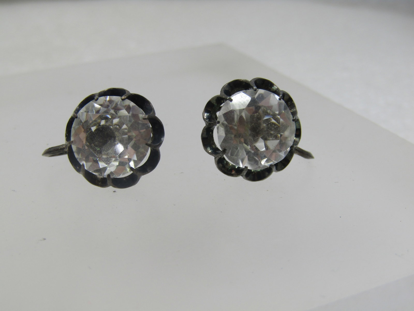 Vintage Silver Clear Quartz Earrings, Screw Back, 1930's-1940's: Vintage Silver Clear Quartz Earrings, Screw Back, 1930's-1940's. These hve a 12mm round nicely cut clear quartz round stone set in a scalloped pront crown-like setting. On the back of the screws one