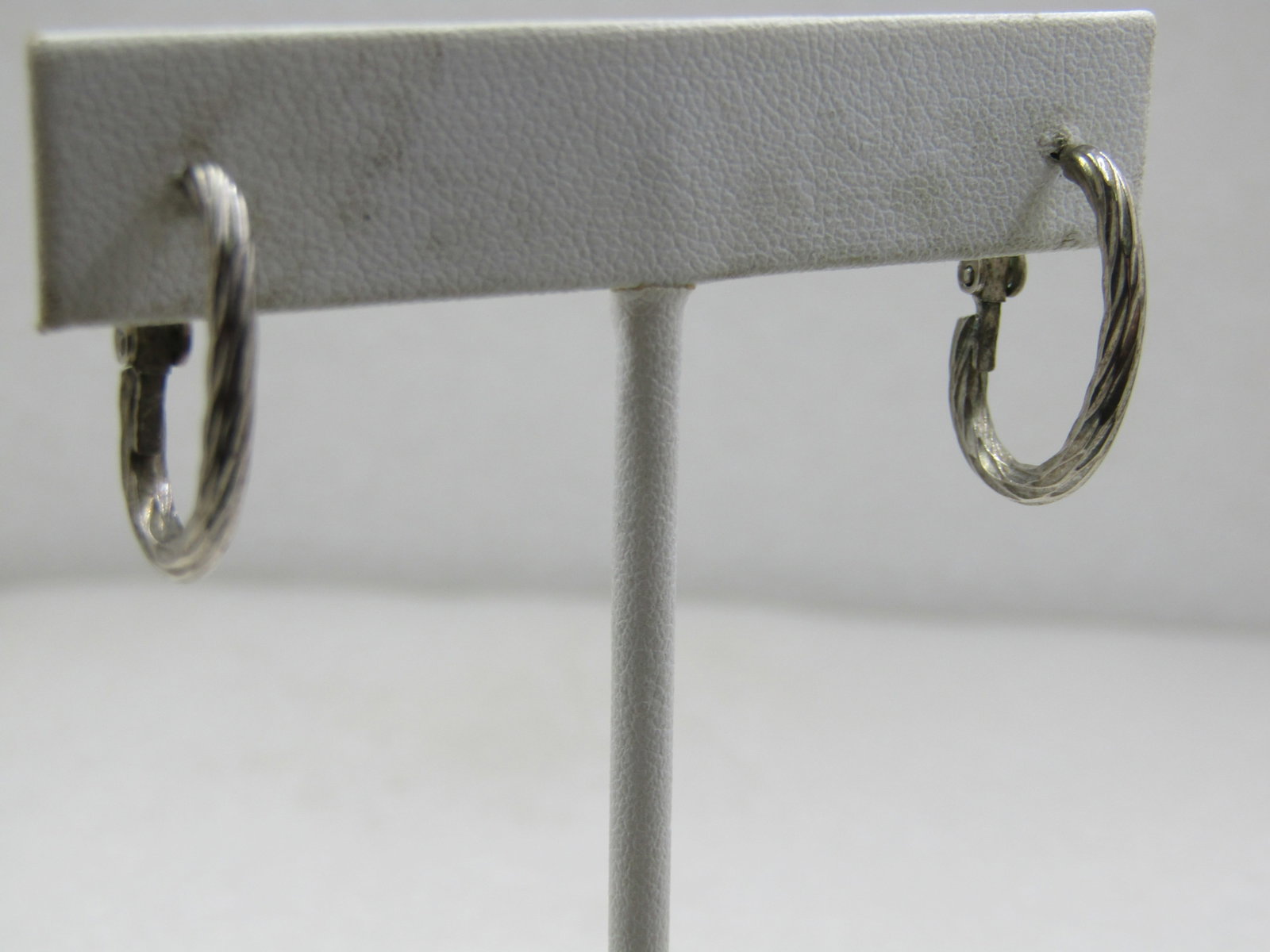 Vintage Oval Twisted Hoop Earrings, 3/4" Pierced: Vintage Oval Twisted Hoop Earrings, 3/4" Pierced. 1970's-1980's. and appx. 2.2mm thick oval . Hinged locking mechanism at back of lobe. Not signed or marked. Very good condition. (INV. W. 101720.3