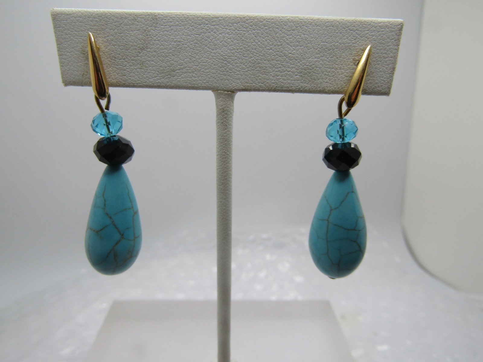 Faux Turquoise & Rhinestone Earrings, Pierced Drop: Faux Turquoise & Rhinestone Earrings, Pierced Drop. Southwestern meets glamour wth these earrings - they have a larger faceted black rhinestone and a smaller aqua on top . The colors work with ech oth
