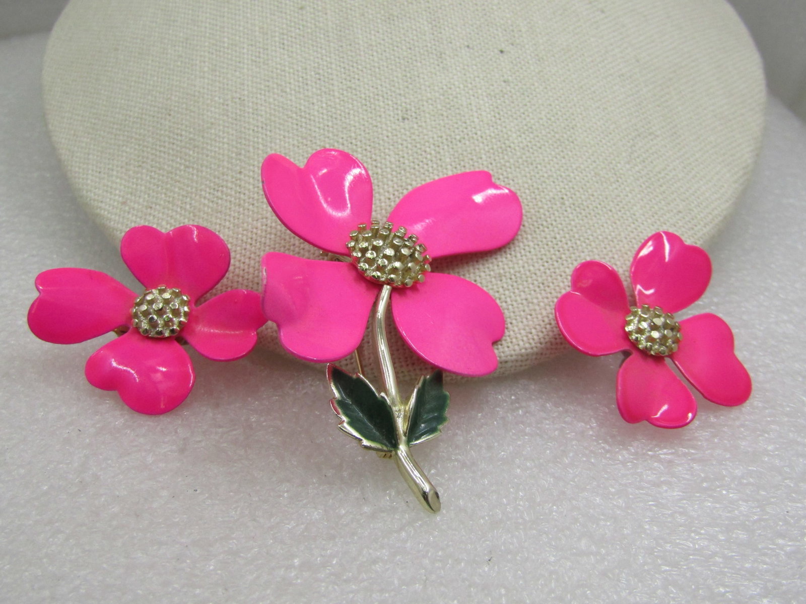 Vintage Neon Pink Brooch & Earrings Set, 1960's Sarah Coventry: Vintage Neon Pink Brooch & Clip Earrings Set, 1960's Sarah Coventry with Mod design with exaggerated elongated petal in the brooch. Gold tone with green enameling on the leaves of the brooch and gold 