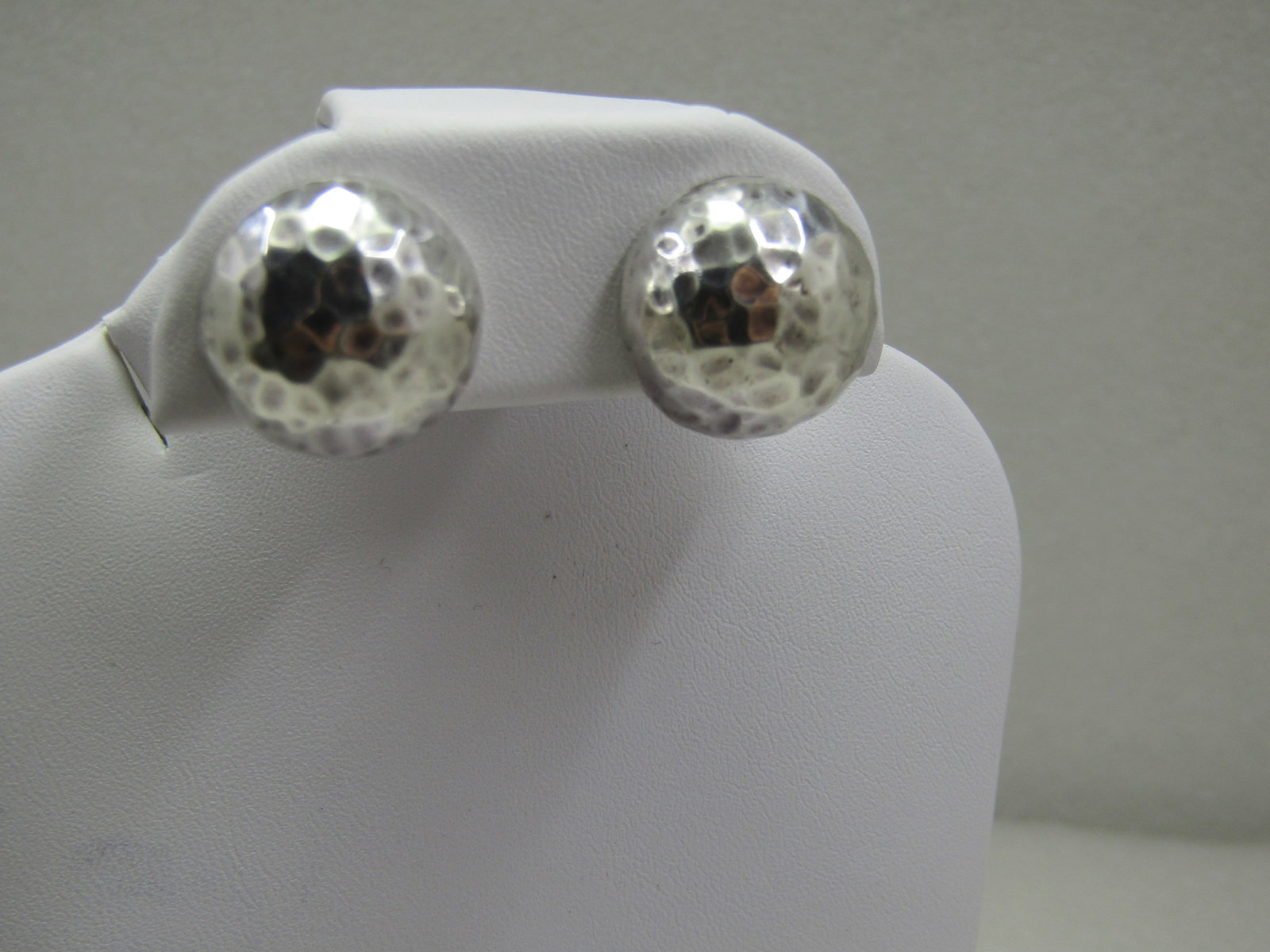 Vintage Sterling Hammered Domed Earrings, Clip: Vintage Sterling Hammered Domed Earrings, Clip. 1960's-1980's 5/8" highly domed half-circle clip earrings with a hammered finish. Marked .925 and tested. Weight is appx 10.28 grams. Very good