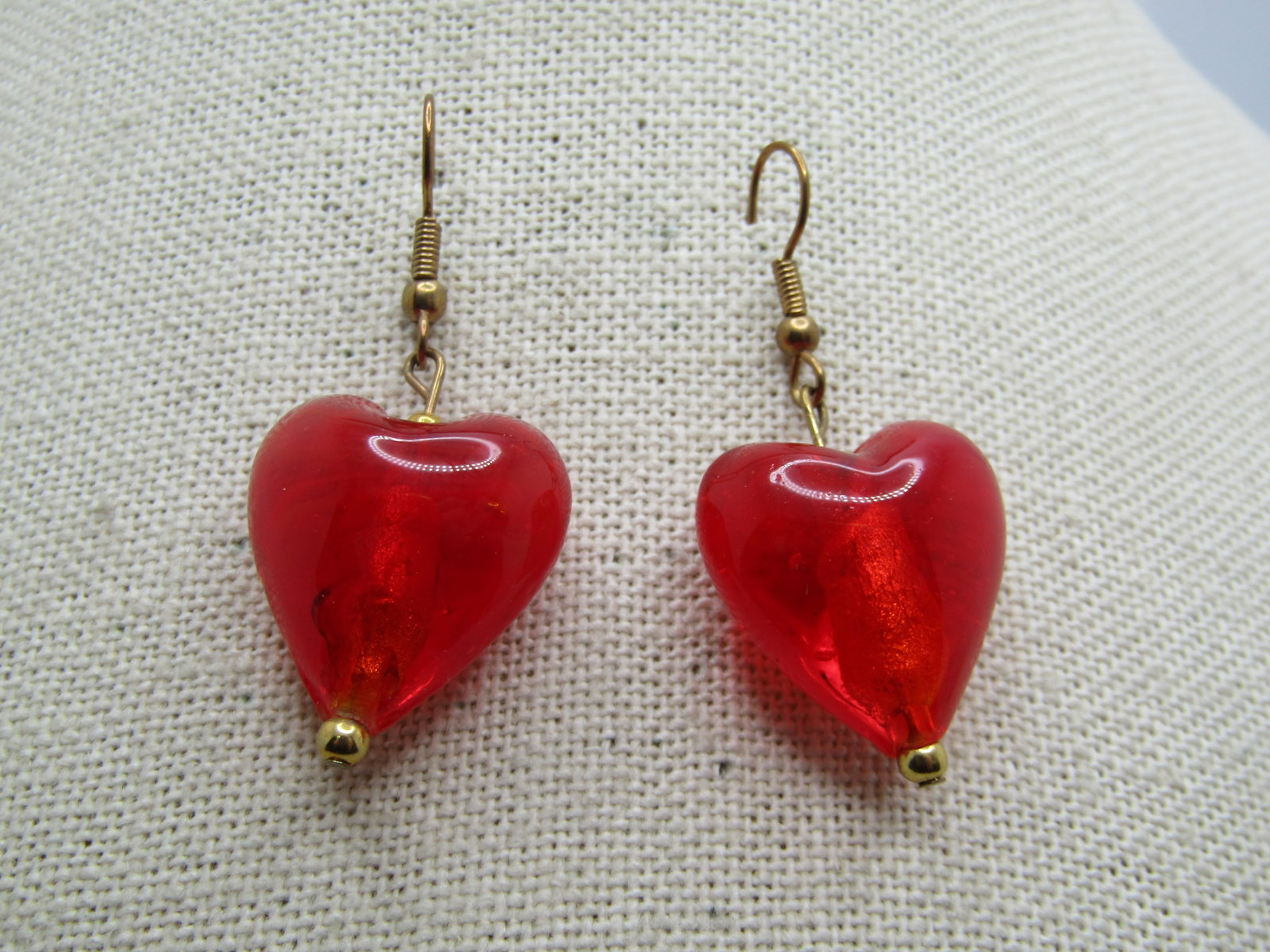 Vintage Red Glass Heart Earrings, Pierced, Foil Centers: Vintage Red Glass Heart Earrings, Pierced, Foil Centers, 1980's-1990's. The hearts are puffy and have a gold tone bead at the bottom. They are appx. 1.75" from the curve in the post and appx. 12.5mm