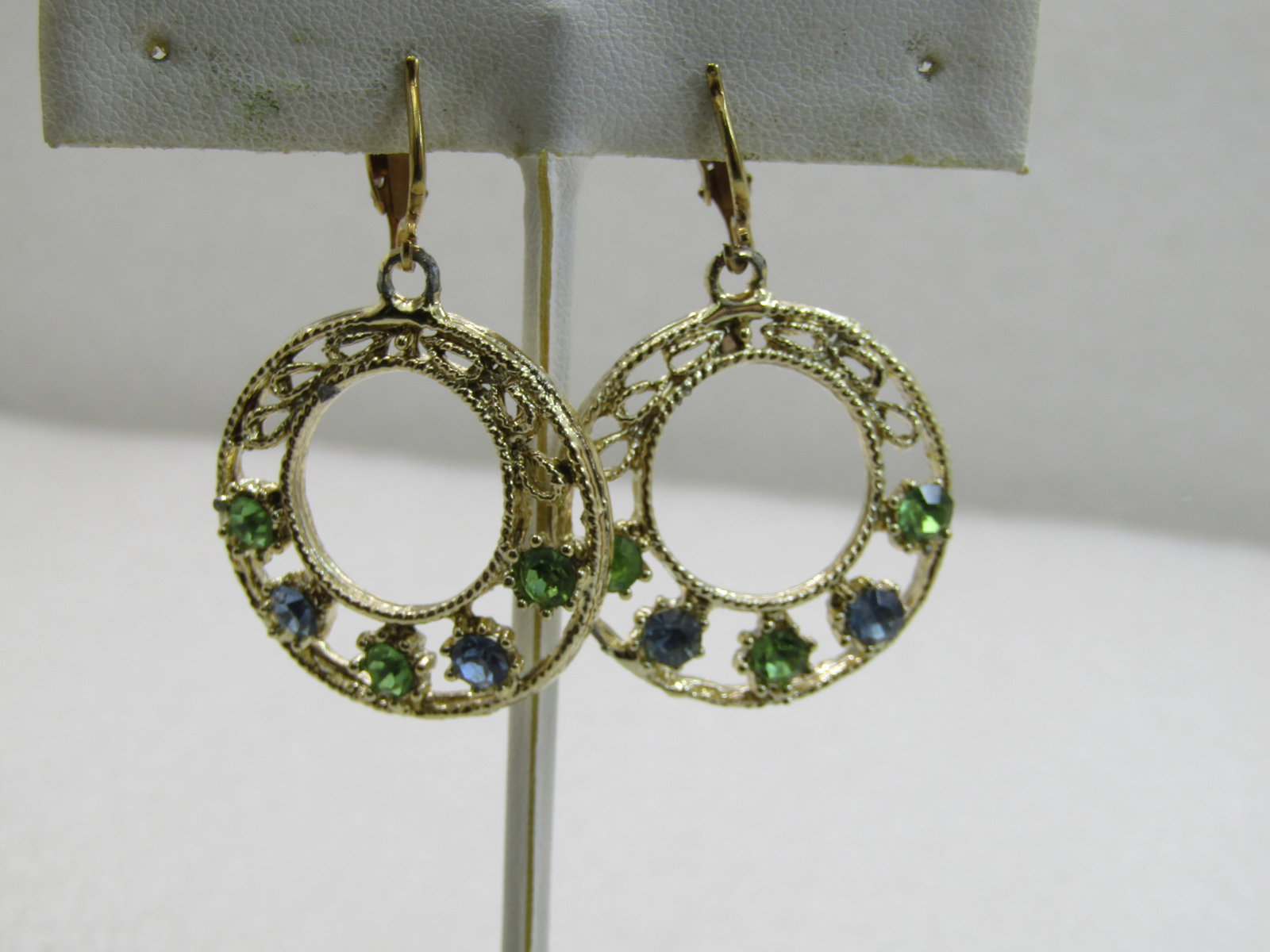Vintage Blue & Green Rhinestone Hoop earrings, Clip, 1960's-1970's: Vintage Blue & Green Rhinestone Hoop earrings, Clip, 1960's-1970's, gold tone and appx. 1.75" long with pastel blue and green rhinestones on the bottom of the hoop, textured framed design. They have
