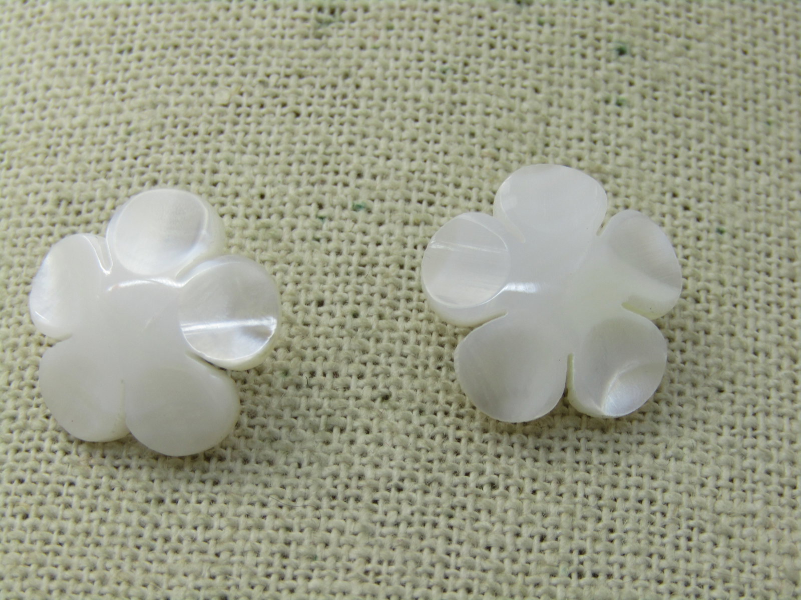 Vintage Mother of Pearl Carved Floral Earrings, Pierced Studs, 7/8" domed: Vintage Mother of Pearl Carved Floral Earrings, Pierced Studs, 7/8" domed/ Silver tone backs. 1980's-1990's. Very good condition, like new. Not signed by the smooth finish - gift quality. (INV. W.27-2