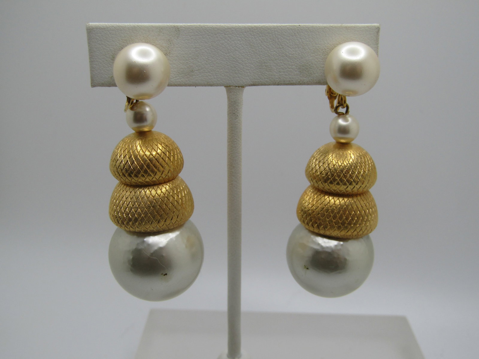 Vintage Faux Pearl Stud Dangle Earrings, Chunky Clip: Vintage Faux Pearl Stud Dangle Earrings, Chunky Clip. Statement earrings with a large faux pearl stud that is appx. 10.5mm round with a drop of a faux pearl then two ridged gold tone caps to a much la