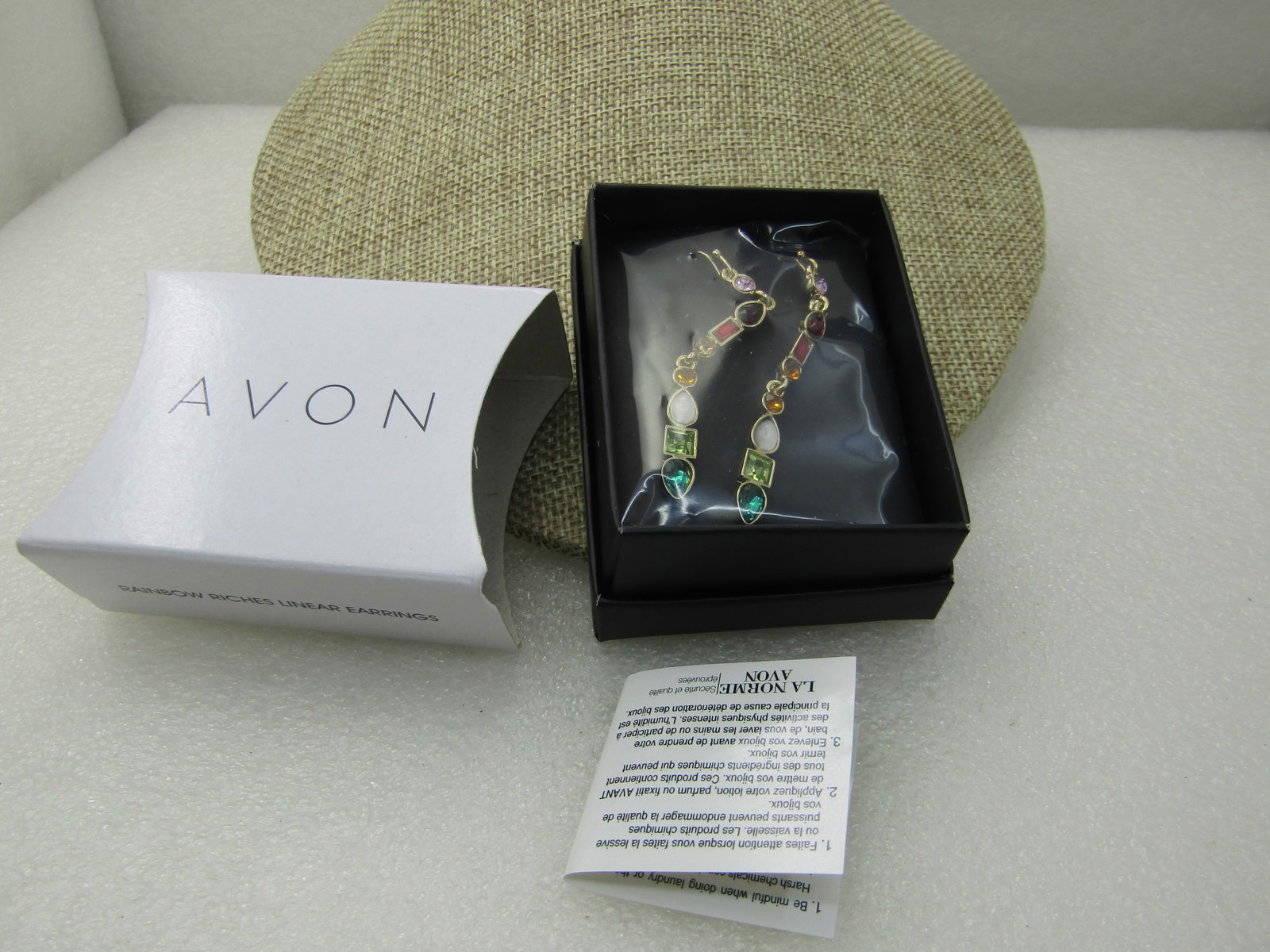 Avon Rainbow Riches Rhinestone Pierced Earrings, Long, New in Box, Unopened: Avon Rainbow Riches Rhinestone Pierced Earrings, Long, New in Box, Unopene. 2.5" long 1/4" wide and slightly wider with a mix of shapes of rhinestones dangling in a row. 2018. New from former seller's