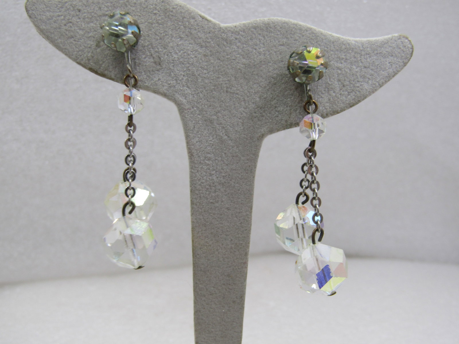 Vintage Crystal Stud and Dangle Beaded Earrings, Clip, 1940's: Vintage Crystal Stud and Dangle Beaded Earrings, Clip, 1940's. Aurora borealis crystal beads. The stud is appx. 7mm with 8 prongs and two dangling beads appx. 11mm with a smaller bead beneath the