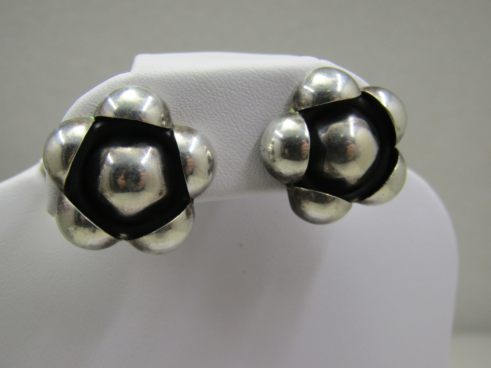 Vintage Sterling Chunky Blossom Earrings, Clip, Mexico: Vintage Sterling Chunky Blossom Earrings, Clip, Mexico. These are 7/8" across with a domed center and a somewhat shadowbox look with five petals around the center and a darkened opening in front of