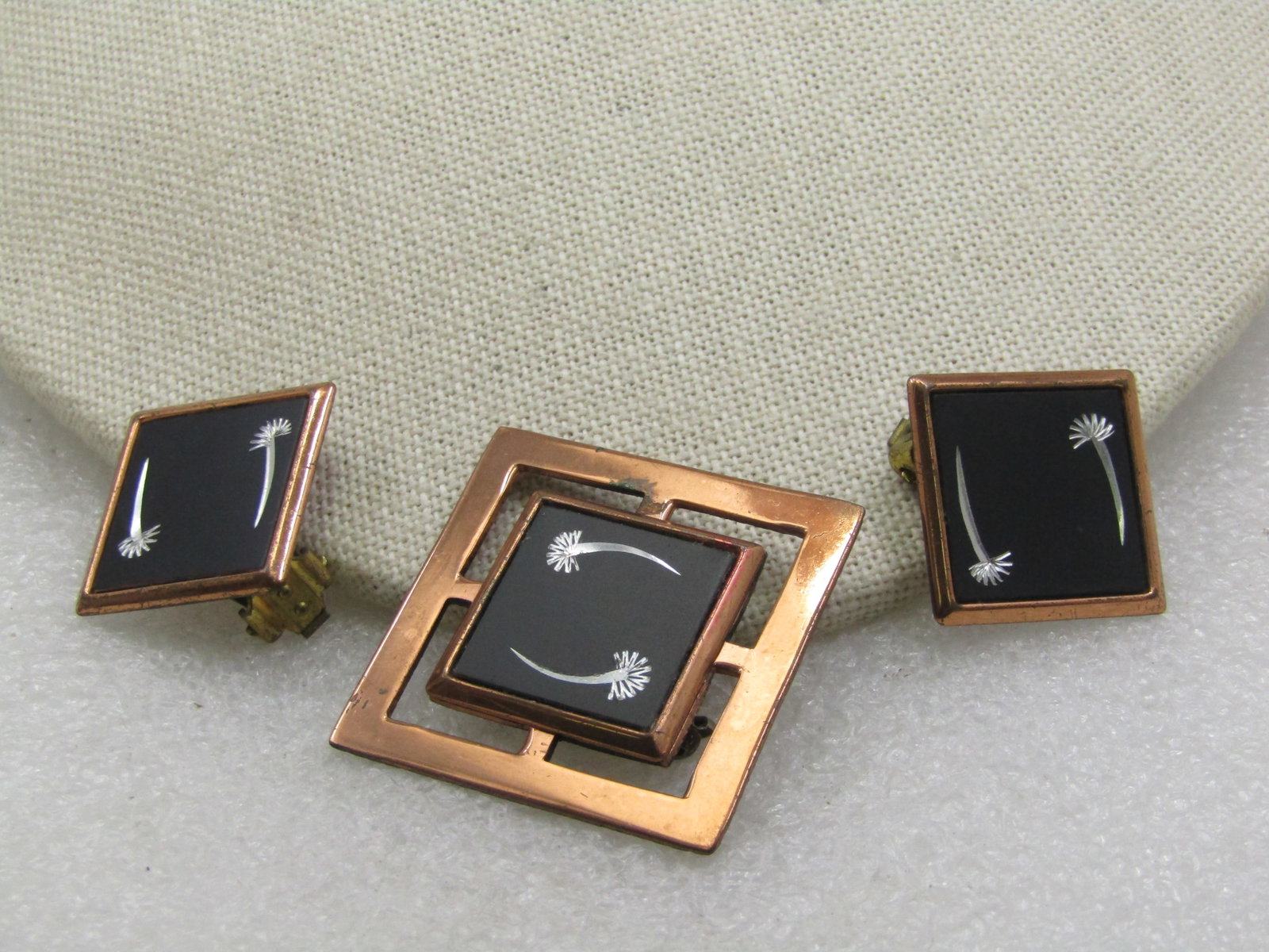 Vintage Copper & Black & Silver Etched Brooch & Clip Earrings Set, Mid-Century: Vintage Copper & Black & Silver Etched Brooch & Clip Earrings Set, Mid-Century. The brooch has a copper window frame look that is 1-3/8" square with a 1" square copper frame set on top with a black me