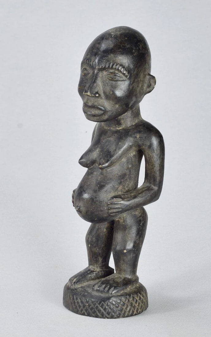 African Art Beautiful Bakongo female Figure Statue sculpture Congo drc: Bakongo Figure Congo DRC - 22 cm (About 8 1/2 inches high) Cute decorative sculpture Wood Average condition Reserve: $90.00 Shipping: Domestic: Flat-rate of $50.00 to anywhere within the contiguous U.