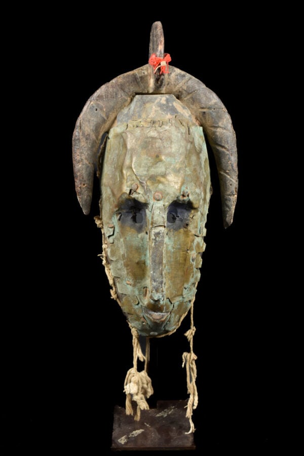 Mask – Wood, Metal – Marka – Mali: Powerfull face mask from Mbagani tribe DR Congo. This type of mask were worn during the initiation proces. Showing typically enlarged concave orbits and bulging coffee-bean eyes. . Good condition with