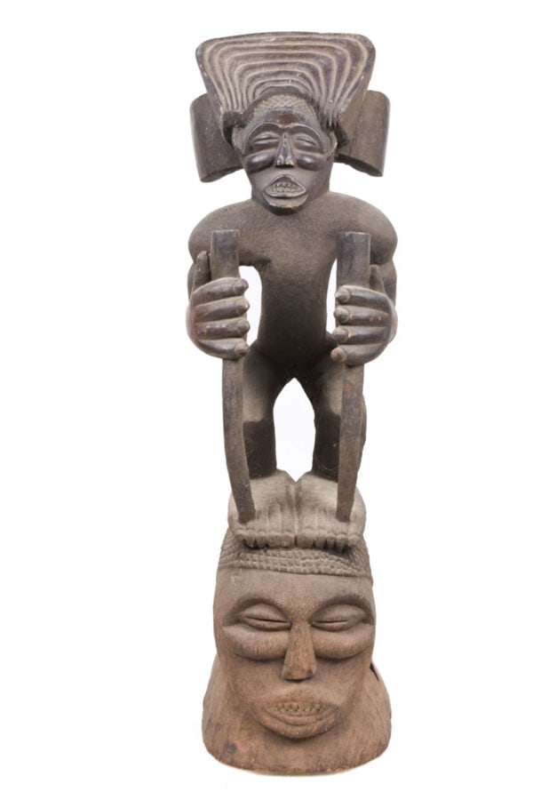 Tshibinda Figure / Crest Mask – Wood – Chokwe – Congo: Stylistic blacksmith bellow from the Punu people of Gaban. Blacksmiths bellows, many quite beautiful, were sculpted in the shape of figures – like this one. These bellows used by the Punu show t