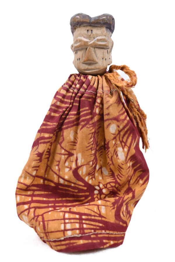 Ancestor figure – Wood, Textile – Ewe – Togo: A fine venavi figure made out of wood. This miniature is used as a doll among the Ewe people. The Ewe people of Ghana celebrate the birth of twins as a good omen. Twins known as Venavi, lead a life of