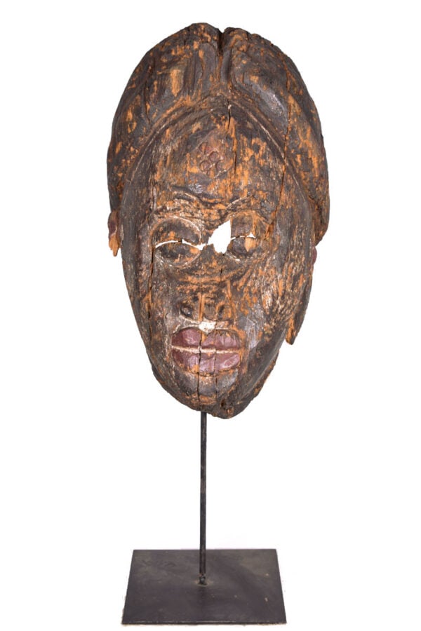 Initiation mask – Wood – Punu – Gabon: Old wooden initiation mask from the PUNU tribe, Gabon. PUNU masks are thought to represent ancestors` faces. They are worn during funerals and by a Moukouji initiate who stands on stilts. This masks h