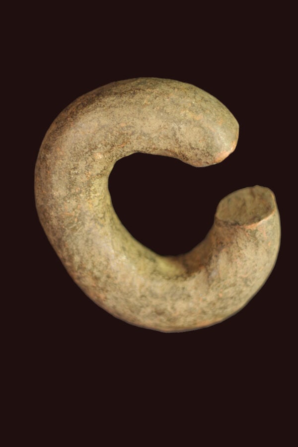 Bracelet / Currency – Bronze Manilla – West Africa: Old copper Manilla – West African trade currency. Manillas are (almost ring-like) bracelets, mostly in bronze or copper, very rarely of gold. They served as a kind of money or barter. They were