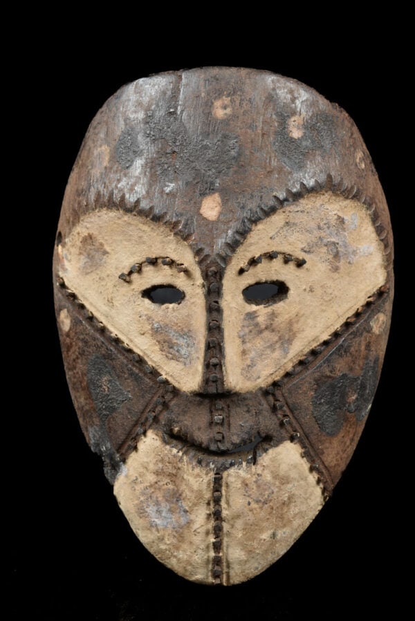 Yela Mask – Wood – Mbole – DR Congo: Unique Mbole mask from DR Congo. These masks are worn by the sacrificing women. Men who did not respect the rules of custom were hanged and these women priests were killing the hanged. There is very