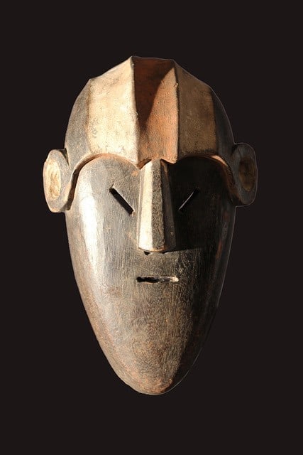 Yela Mask – Wood – Mongo – DR Congo: Stylistic Mbole mask from DR Congo. These masks are worn by the sacrificing women. Men who did not respect the rules of custom were hanged and these women priests were killing the hanged. There is ver