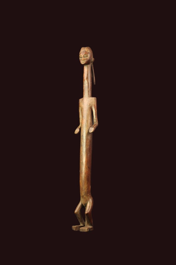 Ancestor Figure – Wood – Nyamwezi – Tanzania: Large standing Nyamwezi ancestor figure from Tanzania. Great stylistic figure in it`s abstract forms. Good condition with a wonderful patina of age. he name Nyamwezi means “people from the moon&