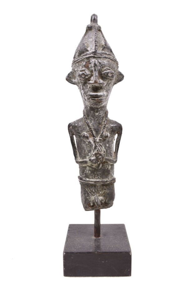 Ogboni Figure – Bronze – Yoruba – Nigeria: The Ogboni society is pervasive among Yoruba-speaking people, but probably originates from the Ijebu. At its head are the wisest man and woman from the community whose role is to adjudicate. Ogboni br