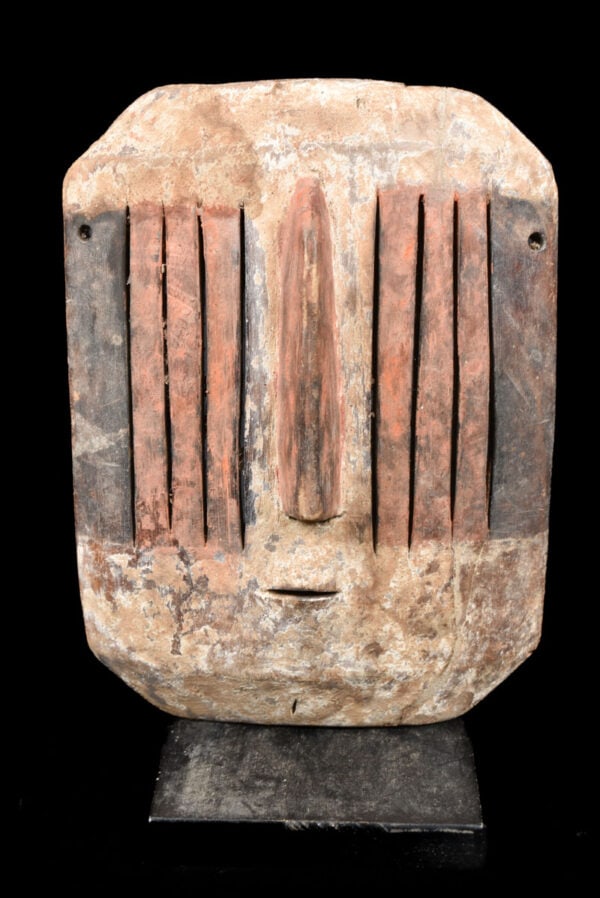 Yela Mask – Wood – Mbole – DR Congo: Stylistic Mbole mask from DR Congo. These masks are worn by the sacrificing women. Men who did not respect the rules of custom were hanged and these women priests were killing the hanged. There is