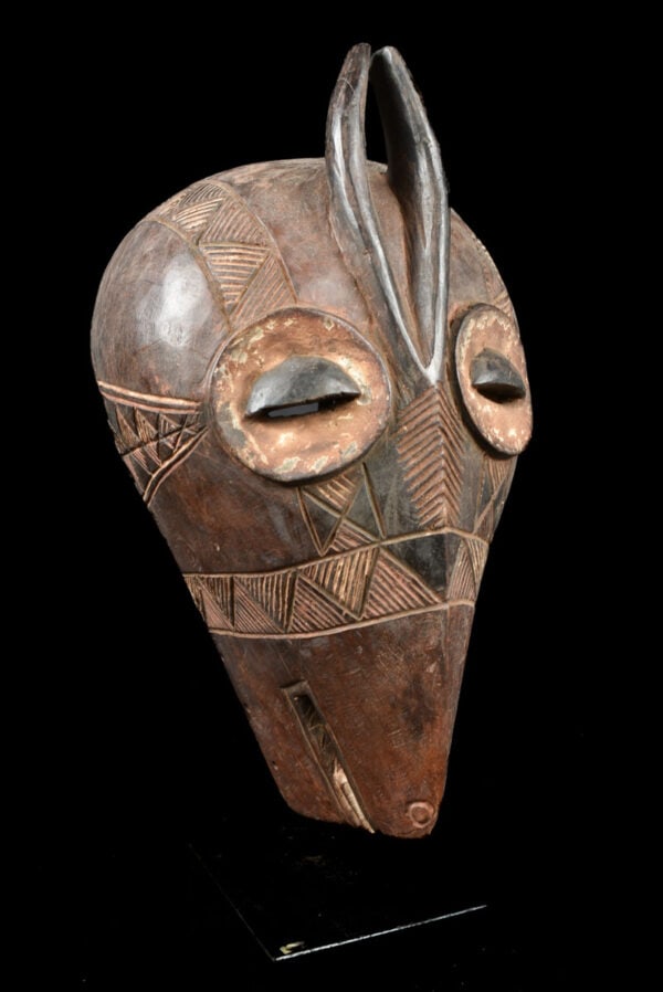 Initiation mask – Wood – Bembe – DR Congo: Beautiful BEMBE owl zoomorphic circumcision mask Called ” Eluba va butende na cwecwe” or “Emangungu” these masks were worn during the initiation rites of young people. “ 
