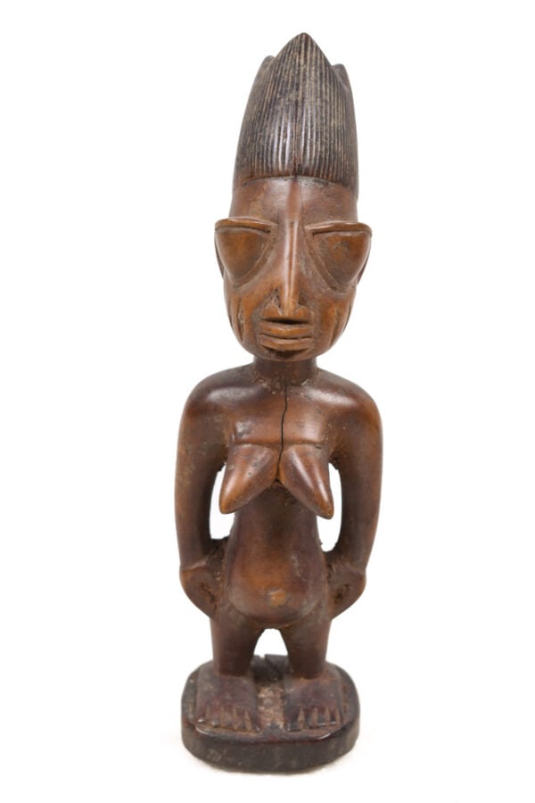 Ibeji Figure – Wood – Yoruba – Nigeria: Appealing Ibeji figure of the YORUBA tribe of Nigeria. Warm expression with a beautiful aged patina, in good condition. Provenance: Manfred Schäfer former gallery owner from Ulm, Germany. Yoruba 
