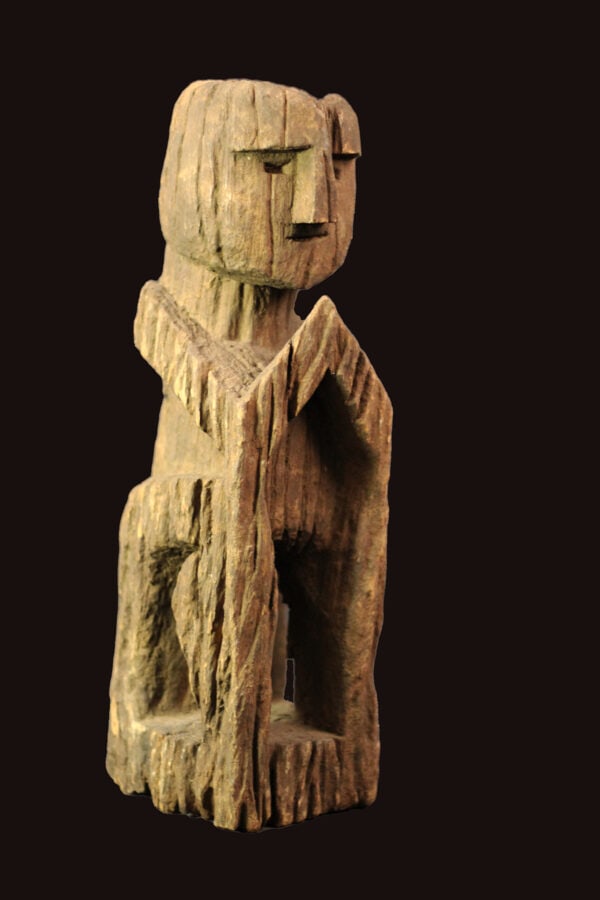 Ancestor Figure – Wood – Nepal: Ancestor figure with red wax stamp on the back. This seal is not just a random mark—it serves an important purpose in verifying the legal export of the mask from Nepal. Great seating wooden