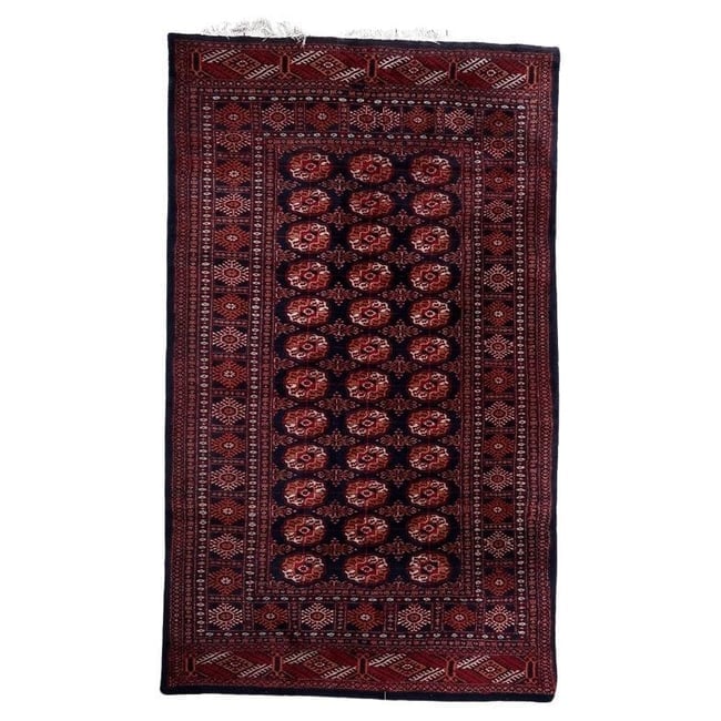 Handmade Vintage Uzbek Bukhara Rug 5' x 8.3' 1960s: Title: Handmade Vintage Uzbek Bukhara Rug 5' x 8.3' 1960s Origin: Uzbekistan Dimension:5' x 8.3' Materials:wool Year:1960s Description:This handmade vintage Uzbek Bukhara rug, crafted in the 1960s,