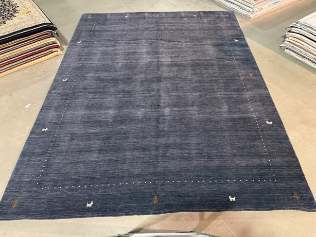 Exquisite Gabeh Rug 9.2x12: Title:Exquisite Gabeh Rug 9.2x12 Description:9.2x12 Stunning Gabeh rug luxerious sheen Natural Wool pile in Denim Navy Blue color Hand Knotted in India Reserve: $1,250.00 Shipping: Domestic: