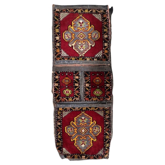 Handmade Vintage Collectible Turkish Yastik Saddle Bag Rug, 1930s: Title: Handmade Vintage Collectible Turkish Yastik Saddle Bag Rug, 1930s Origin: Turkey Dimension:1 ft 5 in x 4 ft 0 in Materials:wool Year:1930s Description:A Rare Piece of Nomadic HistoryAcquire a r