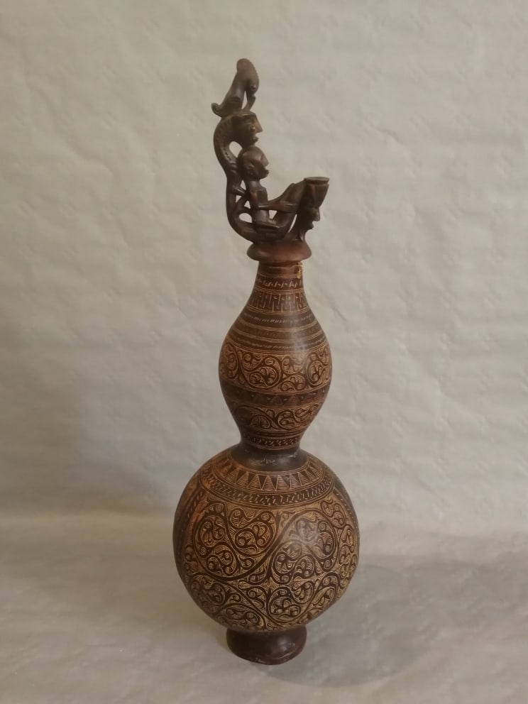 Large Sumatran Meicine conatainer: Date Period: Late 19th century Materials: wood Dimensions: 17inch x 6inch Additional Information: Beautifully carved large Sumatran medicine container Reserve: $75.00 Shipping: Domestic: Flat-rate of