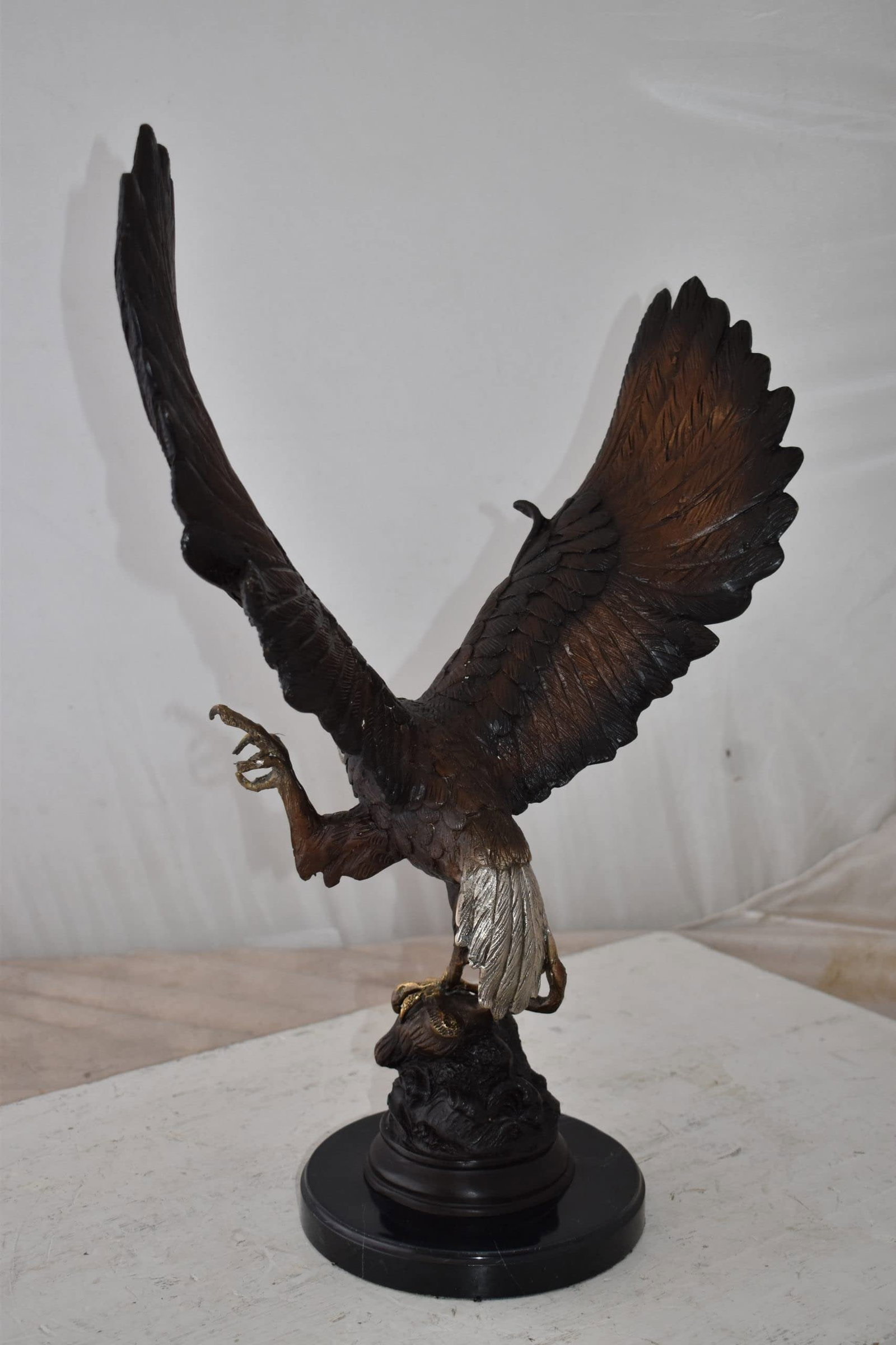 Eagle In Action Trying to Catch His Prey Bronze Statue Size: 17" x 10" x 23"H - 10