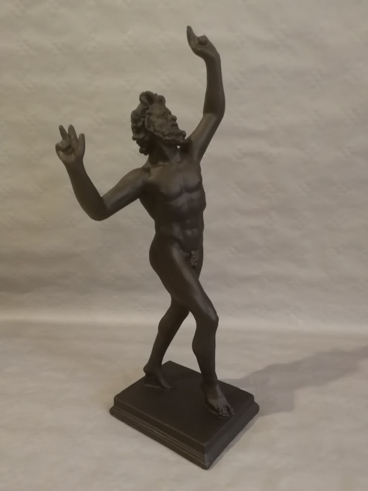 Dancing Faun: Date Period: mid 20th century Materials: Plaster Dimensions: 13inch x 6.3inch Additional Information: Dancing Faun replica sculpture from Pompeii Reserve: $50.00 Shipping: Domestic: Flat-rate of