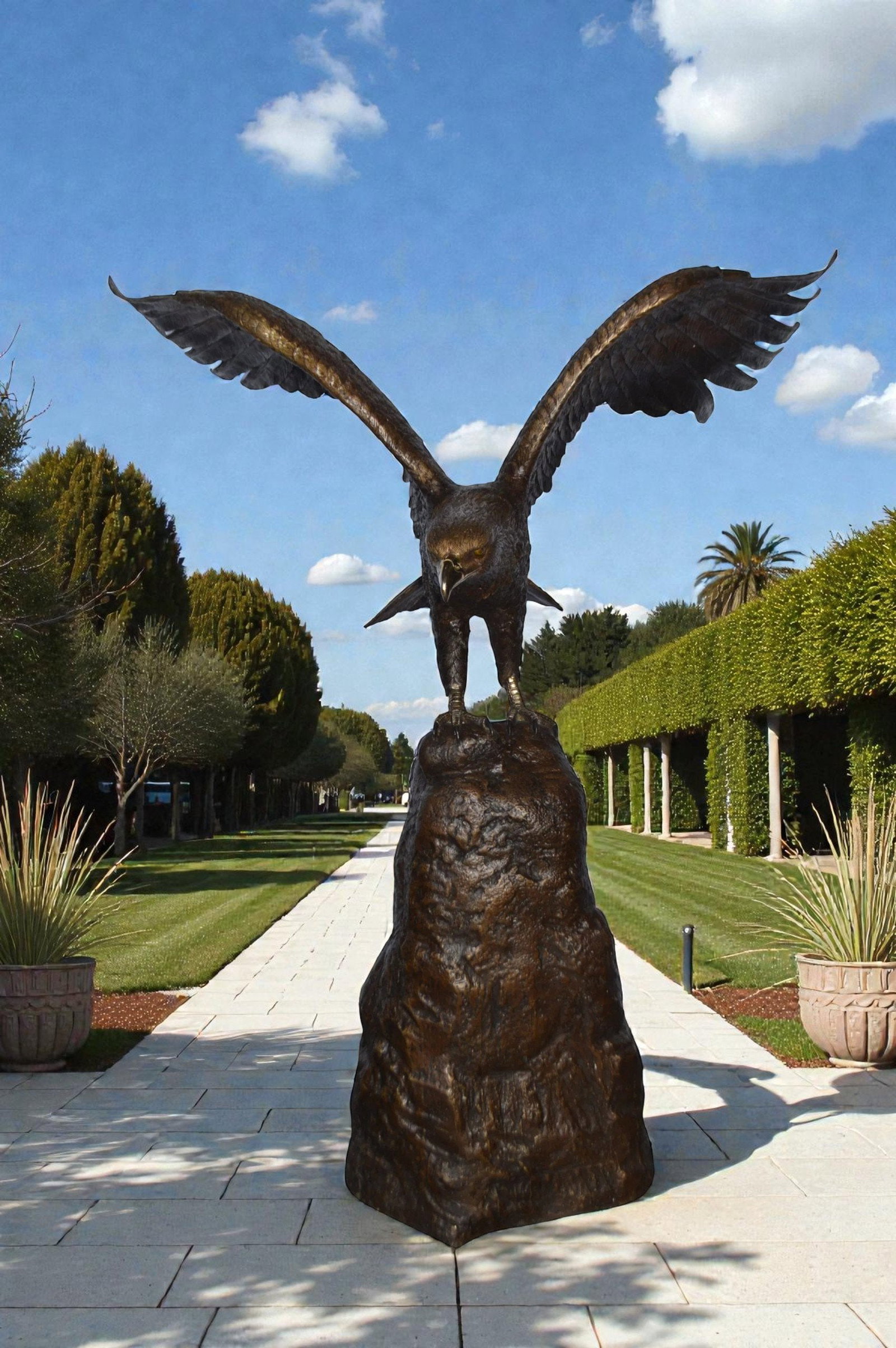 Eagle Landing on a Rock Bronze Statue - Size: 51"L x 36"W x 58"H. - 2