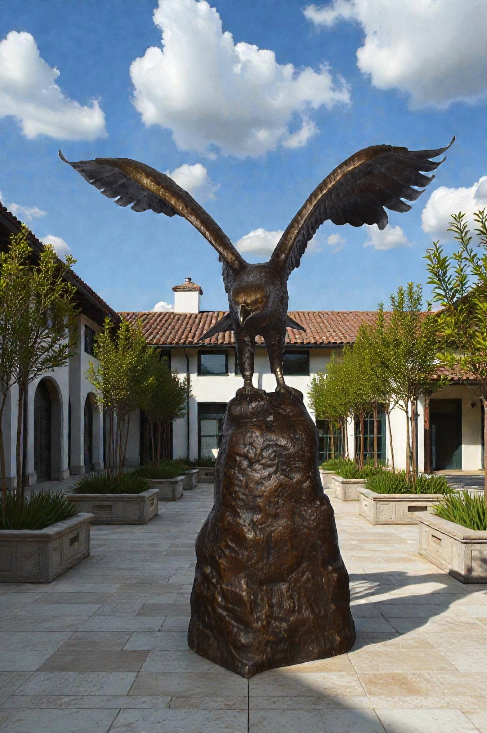Eagle Landing on a Rock Bronze Statue - Size: 51"L x 36"W x 58"H. - 3