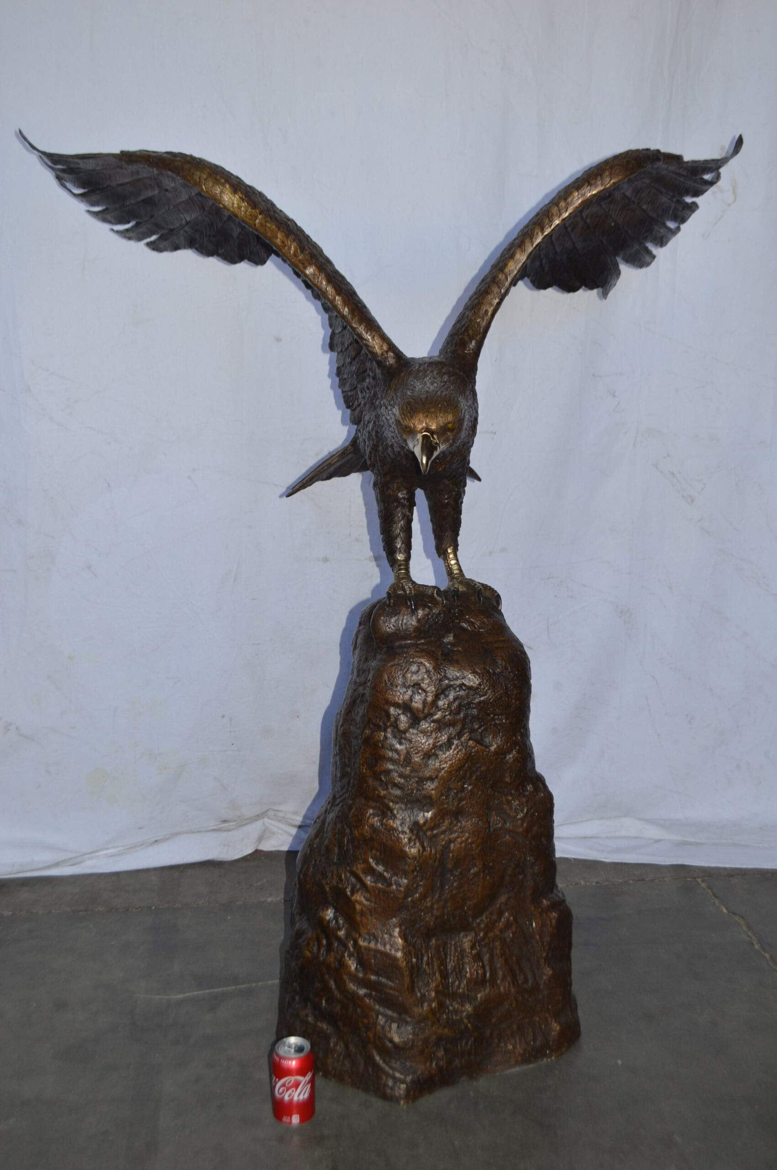 Eagle Landing on a Rock Bronze Statue - Size: 51"L x 36"W x 58"H. - 4