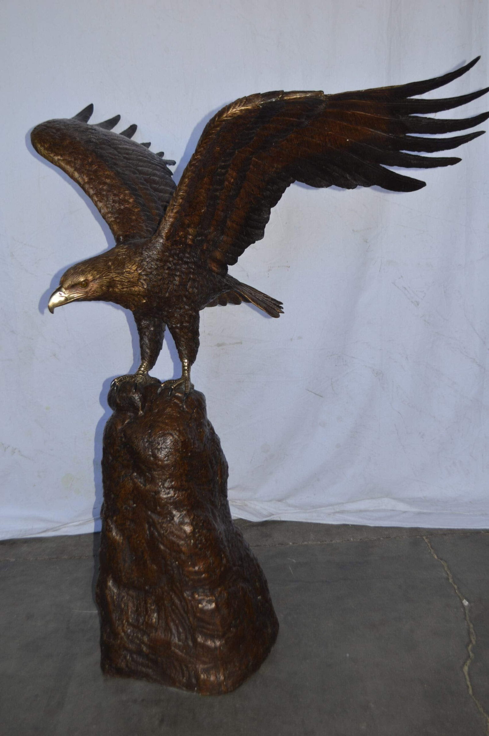 Eagle Landing on a Rock Bronze Statue - Size: 51"L x 36"W x 58"H. - 6